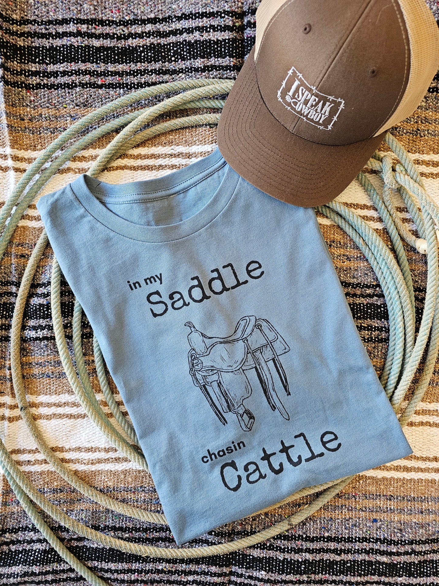 IN MY SADDLE CHASIN CATTLE